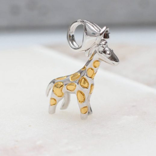 Silver and gold giraffe charm