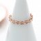 original_18ct-rose-gold-band-of-flowers-ring (1)