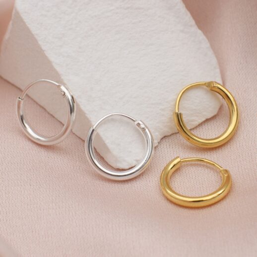 silver and gold huggie hoop earrings