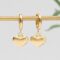 mini gold huggie hoop earrings